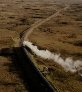 Hoofdstuk 3/4. De trein die door een mooi landschap tuft.